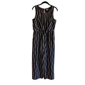 LUXOLOGY, BLACK WITH WHITE STRIPE, SLEEVELESS, CROPPED JUMPSUIT. SIZE 6